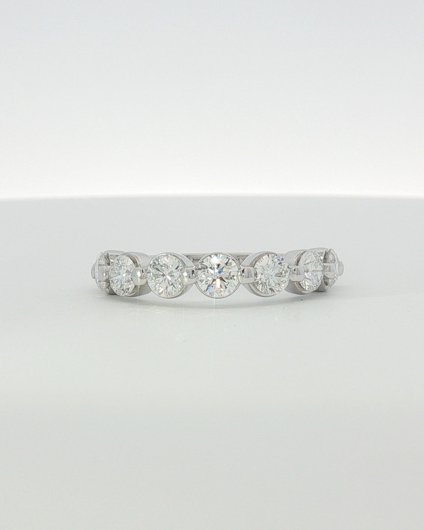 18K White Gold 1.50 ctw Seven Stone Shared Prong Diamond Band