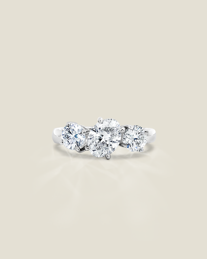 18K White Gold 1.82 ctw Oval & Round Three Stone Ring