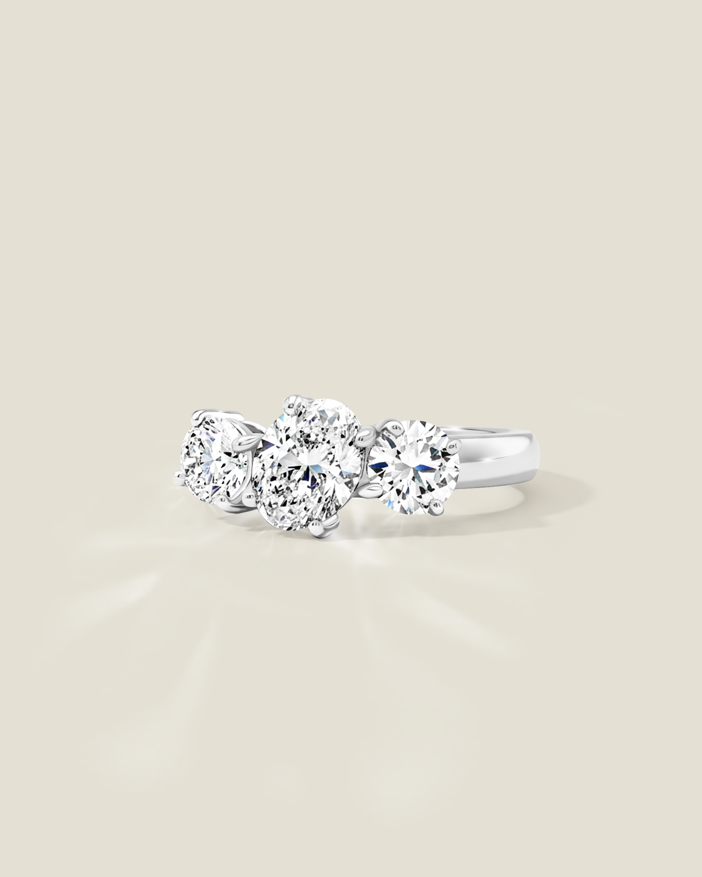 18K White Gold 1.82 ctw Oval & Round Three Stone Ring