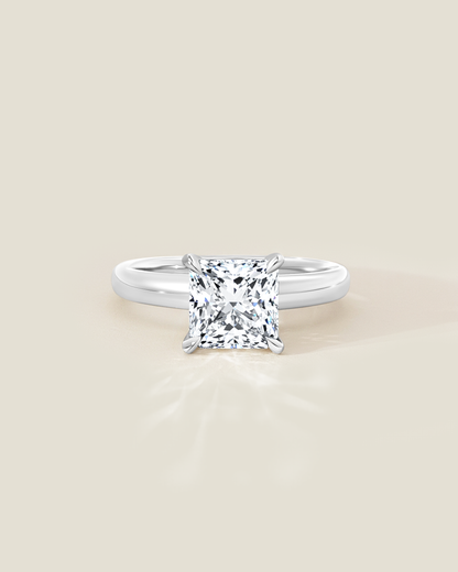 18K White Gold 2.11 ctw H/SI2 Sq. Radiant Osheeli Solitaire Ring
