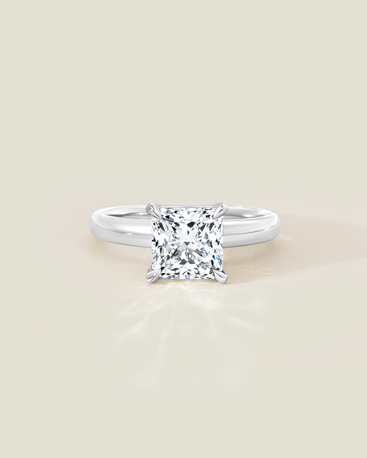 18K White Gold 2.11 ctw H/SI2 Sq. Radiant Osheeli Solitaire Ring