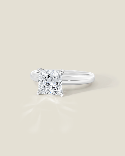 18K White Gold 2.11 ctw H/SI2 Sq. Radiant Osheeli Solitaire Ring