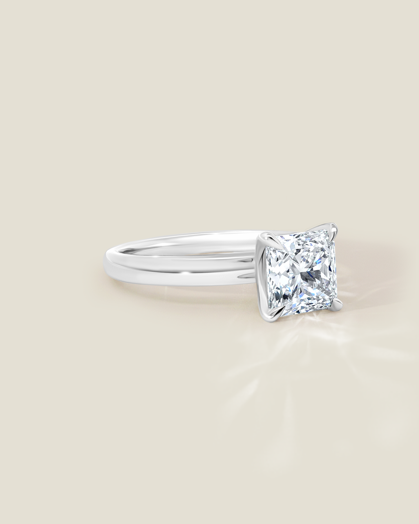 18K White Gold 2.11 ctw H/SI2 Sq. Radiant Osheeli Solitaire Ring