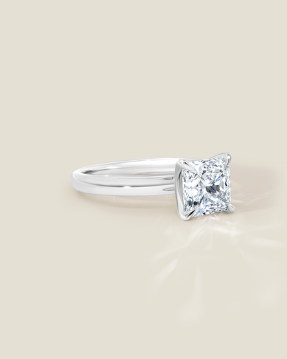18K White Gold 2.11 ctw H/SI2 Sq. Radiant Osheeli Solitaire Ring