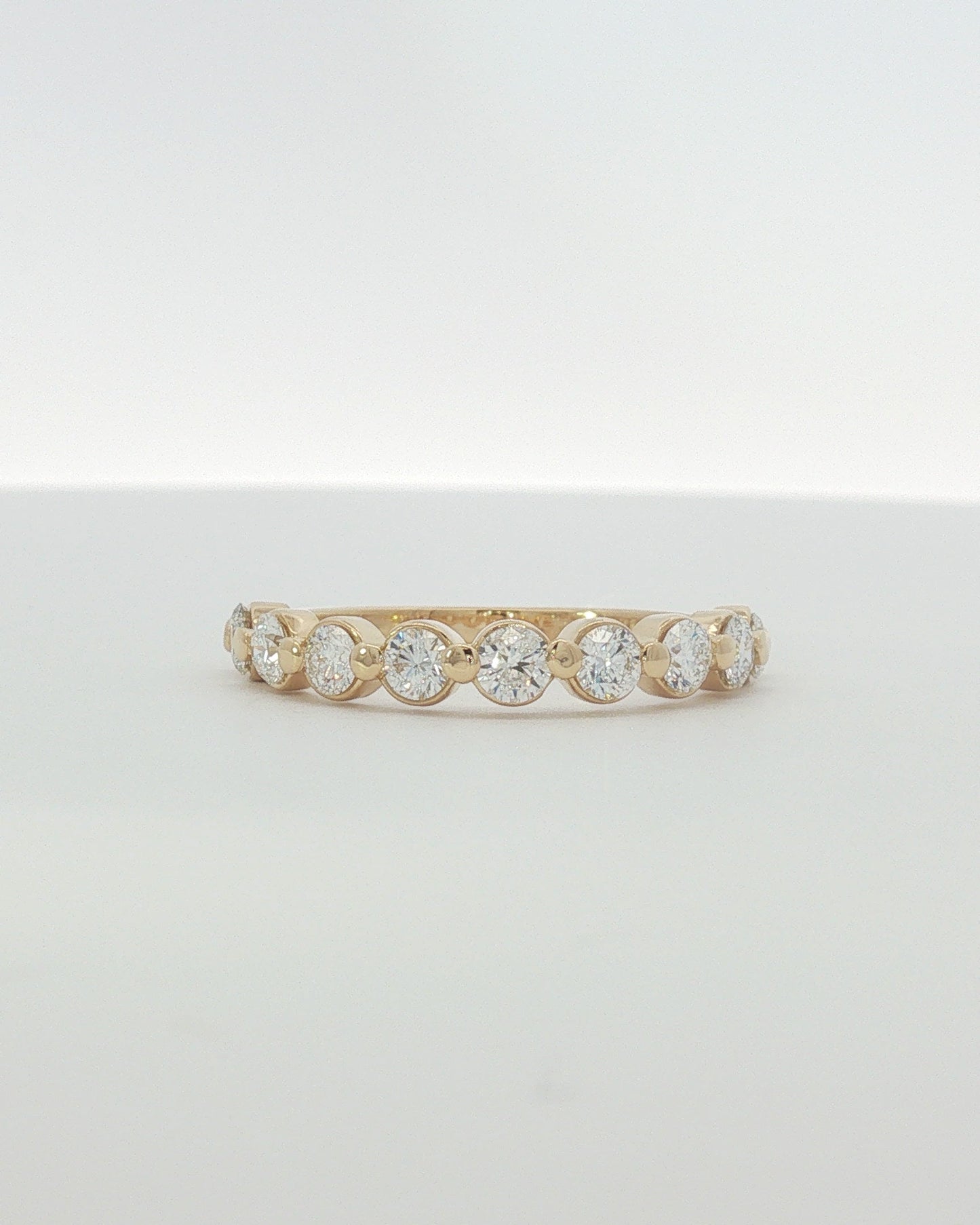 18K Yellow Gold 0.90 ctw Nine Stone Shared Prong Diamond Band