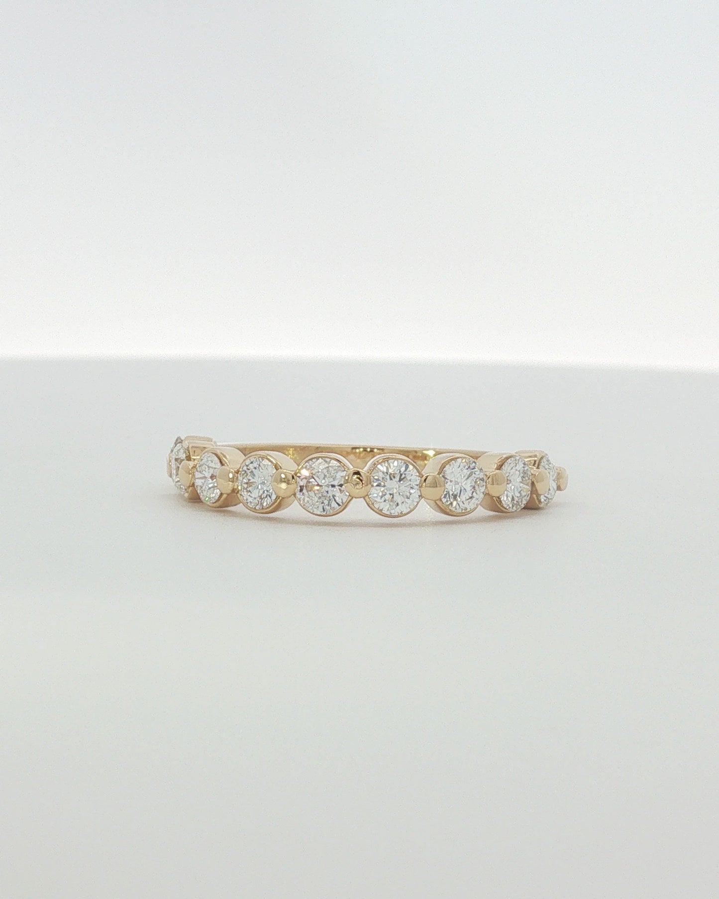 18K Yellow Gold 0.90 ctw Nine Stone Shared Prong Diamond Band