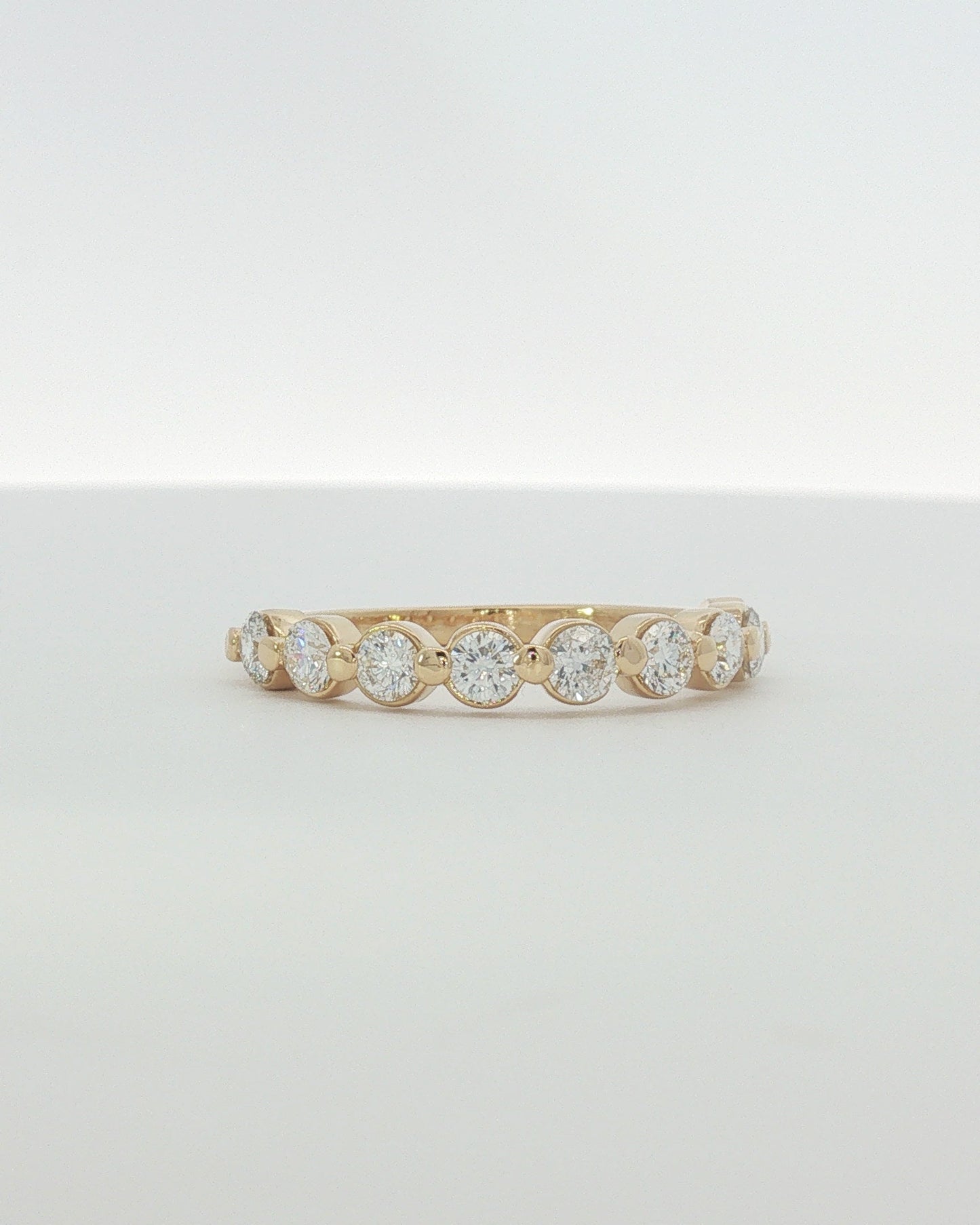 18K Yellow Gold 0.90 ctw Nine Stone Shared Prong Diamond Band