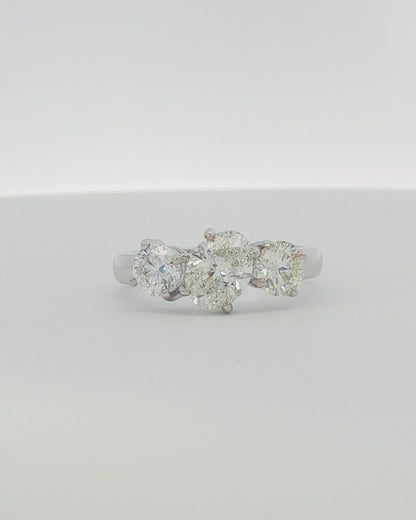 18K White Gold 1.82 ctw Oval & Round Three Stone Ring